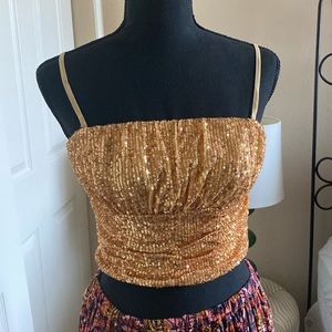 6. Free People Ta Da Top in Gold